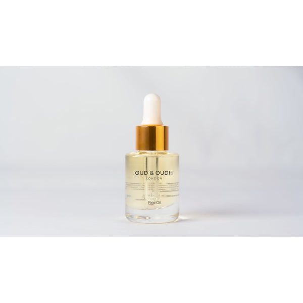 golden sand oud perfume oil in dropper bottle