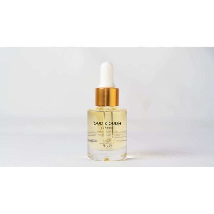 Oud fragrance in a dropper bottle